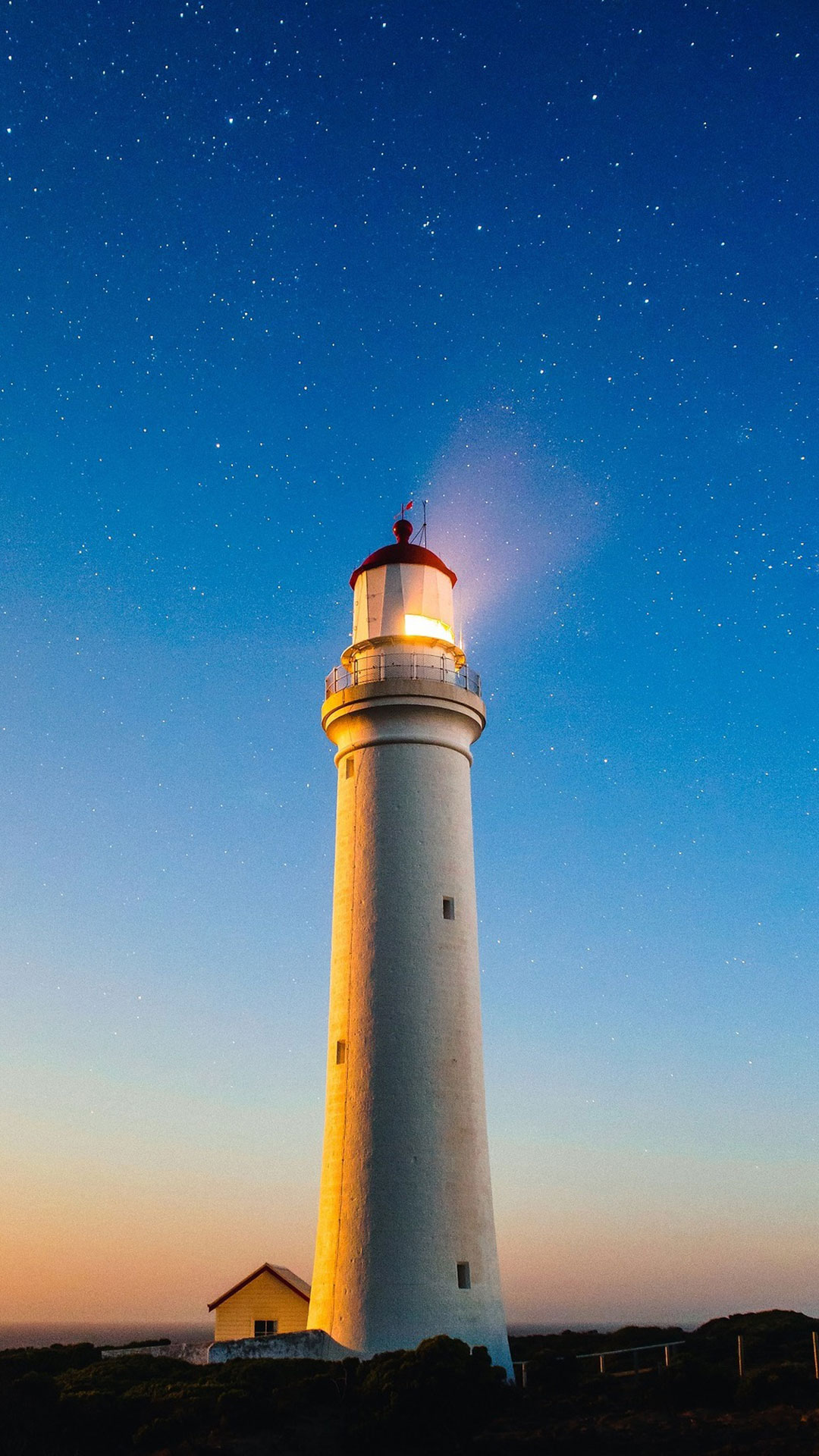 Un Faro al Amanecer - Fondos de Pantalla para Celular