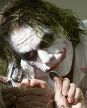 The Joker con su moneda